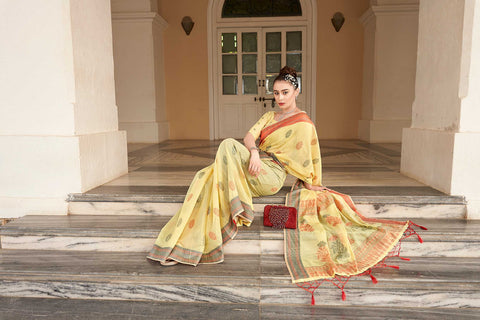 YELLOW LINEN PRINTED COLORFUL FLORAL BUTTA WITH FLORAL DESIGN PALLU SAREE WITH TASSEL IN BORDER