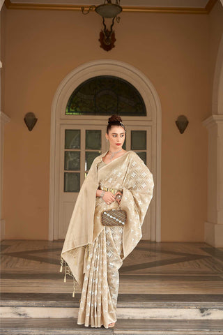 CREAM SILK LINEN CHECKERED IN BOTANICAL DESIGN BUTTA SAREE WITH ETHNIC MOTIF PALLU AND TASSEL IN BORDER