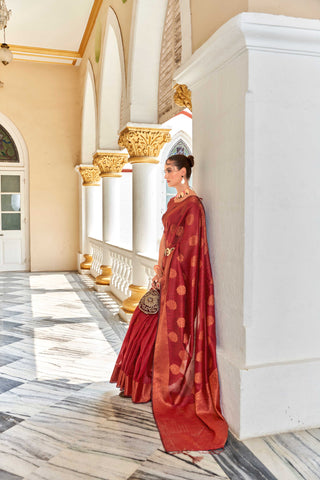 RED LINEN FLORAL COPPER ZARI BUTTA SAREE WITH BOTANICAL WOVEN BUTTA PALLU AND TASSEL IN BORDER