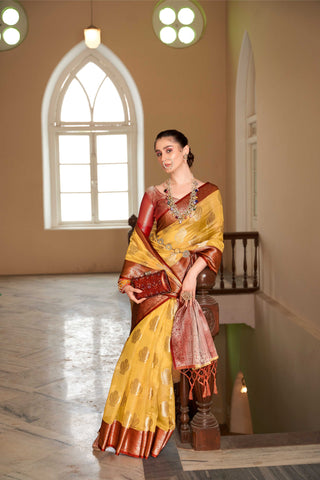 ORANGE LINEN BOTANICAL BUTTA SAREE WITH ETHNIC MOTIF GOLDEN ZARI RED PALLU AND TASSEL IN BORDER